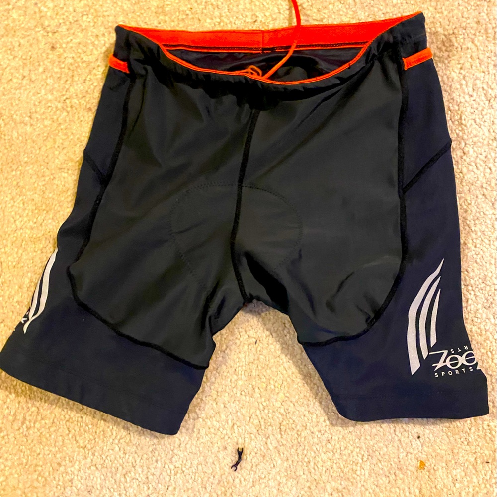 Zoot brand triathlon shorts. Black and orange. Size medium.